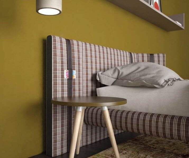 particolare letto imbottito con cinghia porta smart-phone